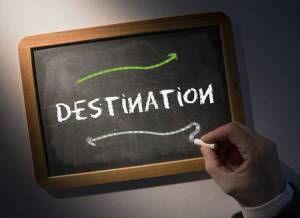 26806739-hand-writing-the-word-destination-on-black-chalkboard